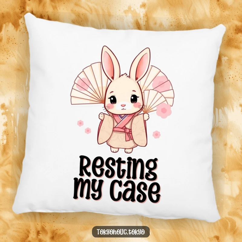 Funny pillow with a sweet bunny in a kimono, peeking from behind fans, offering comfort and a touch of playful humor to any sofa.